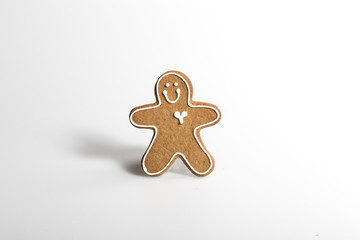 Fototapeta na wymiar Gingerbread cookie man close up isolated on a white background