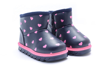 baby with a pattern of hearts boots isolated on white