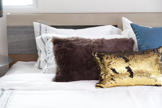 Luxury Gold Pillow On A Bed In Bedroom