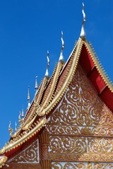 Fototapeta premium Wat Sri Mongkol Golden Top roof blue sky cloud