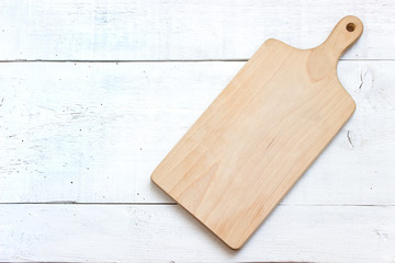 Wooden chopping board on white background