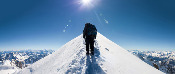 Naklejka premium climbers approach the mountain top