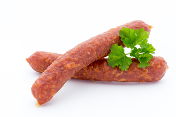 Smoked sausage salami isolated on a white background.