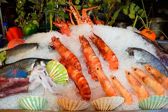 Fresh fish and seafood displayed outside a restaurant, Rethymno, Crete, Greece.