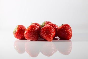 Strawberries isolated against a white background