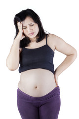 Pregnant woman feeling headache