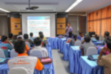 Fototapeta premium blurred focus, student learning business sitting in classroom with teacher front 