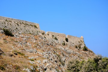 Fototapeta na wymiar View of the Venetian castle on top of the hill, Rethymno, Crete, Greece.