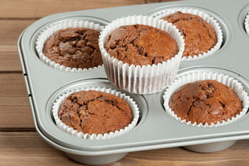 Homebaked Muffins With Chocolate, Banana, Coconut In Baking Tray