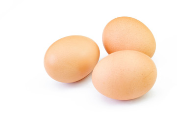 brown chicken eggs isolated on white background