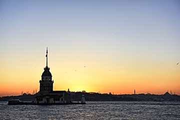 Fototapeta premium Maiden's Tower with sunset on Istanbul bosphorus with long exposure shot