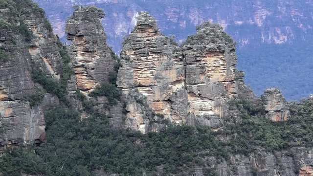 The Three Sisters rock formation in the Blue Mountains of New South Wales, Australia, on the north escarpment of the Jamison Valley.