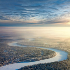 Top view of forest river in winter