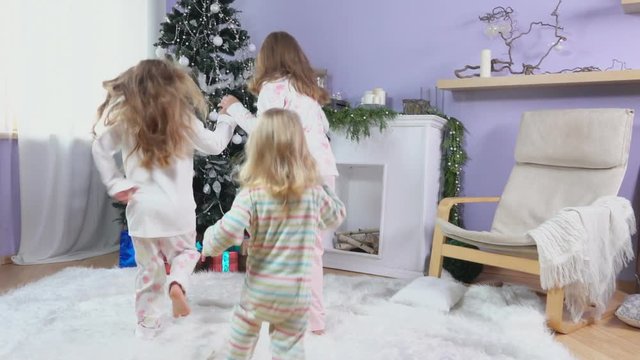 Girls run for gifts on Christmas morning