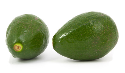 two ripe avocados isolated