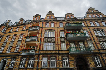 Fototapeta na wymiar Art Nouveau facade of the building with balconies in Poznan