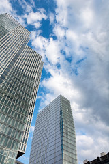 Obraz na płótnie Canvas Bottom view of 155 meter high Deutsche Bank Twin Towers