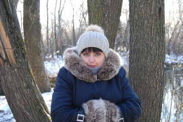 woman in winter forest holiday
