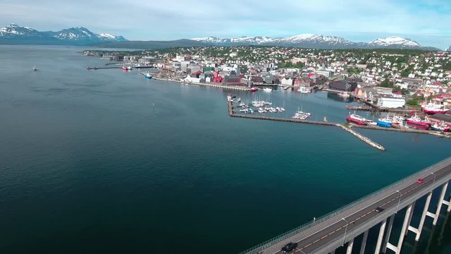 Aerial footage from Bridge of city Tromso, Norway aerial photography. Tromso is considered the northernmost city in the world with a population above 50,000.