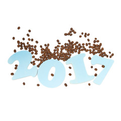 Blue wooden figures of 2017 and coffee beans on a white background