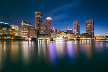 The Boston skyline at night, seen from Fort Point in South Bosto