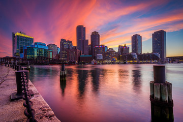 The downtown skyline at sunset, seen from Fort Point in Boston,