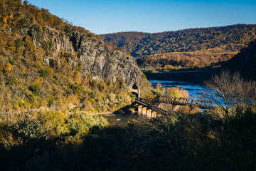 Fototapeta na wymiar View of railroad bridges and the Potomac River, in Harpers Ferry