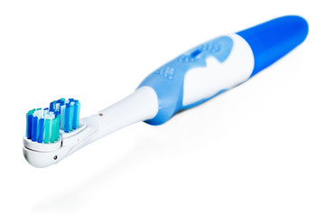 Electric toothbrush isolated on a white background