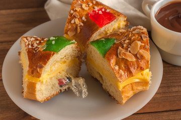 Pieces of Kings cake (Roscon de Reyes) with surprise