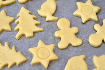 Sweet shortbread dough fingers on white background.