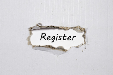 The word register appearing behind torn paper