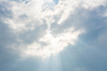 blue sky with cloud and sunlight ray
