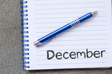 December text concept on notebook