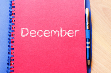 December text concept on notebook