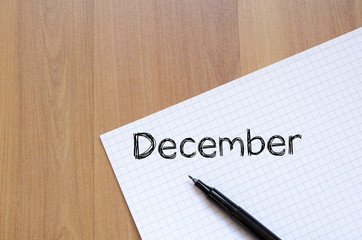 December text concept on notebook