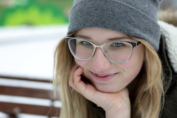 Smiling teen on bench