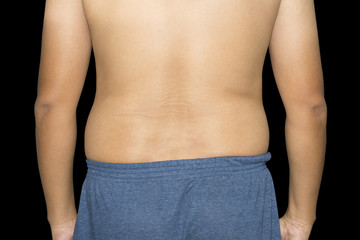 Naklejka premium Excess fat around the waist isolated on black