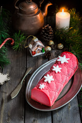 Christmas cake with decoration on wooden table. Selective focus.