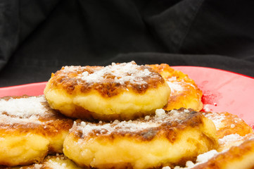 red plate of pancakes