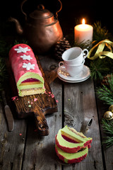 Christmas cake with decoration on wooden table. Selective focus.