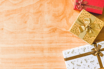 Top view of Gift boxes on wooden table background