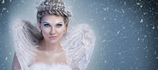 Magic snow queen - winter woman with wings, winter fairy