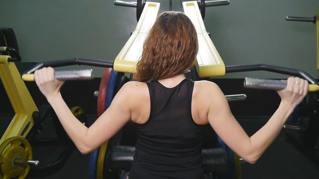 Woman at the gym working out