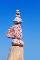 Balance and poise stones. Rock zen on the background of blue sky