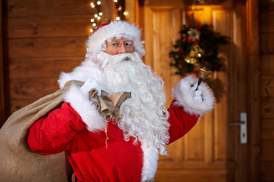 Traditional Santa Claus with bell