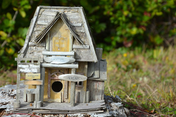Wooden toy motel. Closeup view