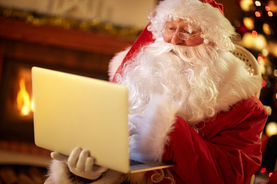 Santa Claus  using laptop