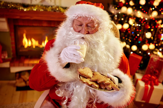 Real Santa Claus enjoying in served food