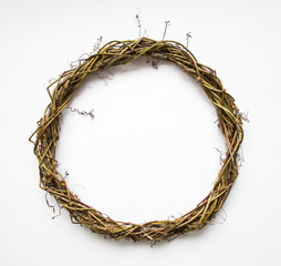 Handmade wreath of vines, blank for decoration. Flat lay, top view, view from above