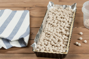 Cooking Process Of Homebaked Tart. Raw Dough In Baking Tray. Cer